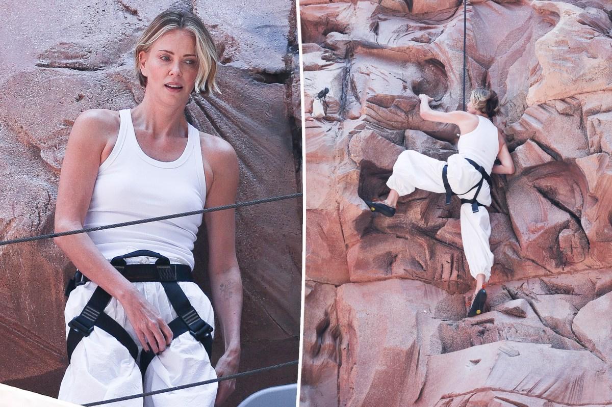 Charlize Theron takes âApexâ promo to new heights with wall-climbing stunt in NYC