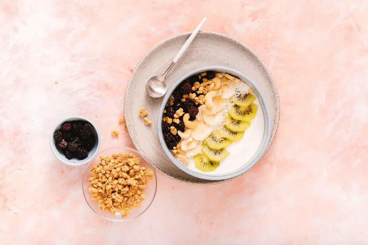 Ingredients for egg-free flan being whisked together in a bowl