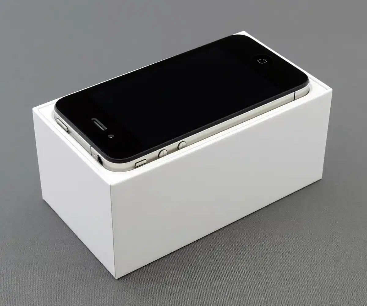 Complete smartphone package with original box, charger, and accessories ready for resale