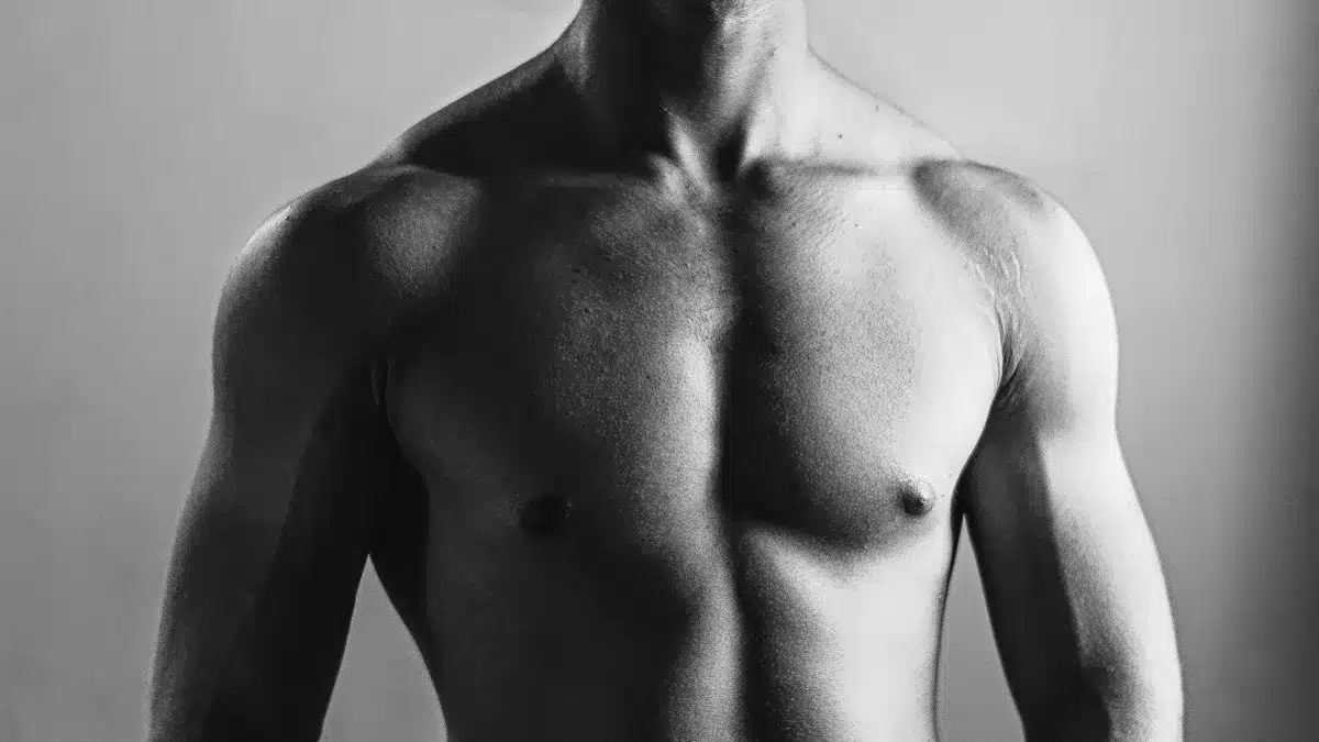 Athlete with muscular build demonstrating diverse body types and health