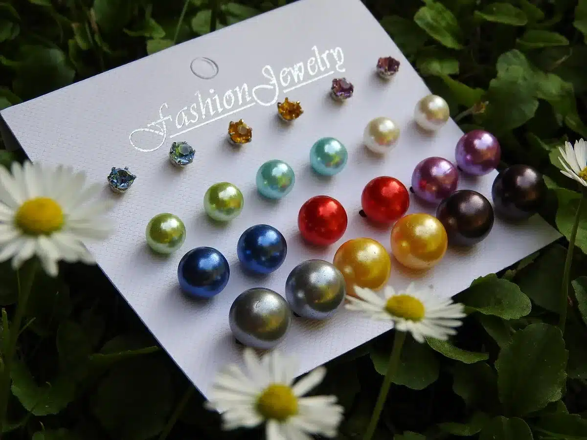 Close-up of sparkly drop earrings on a display card