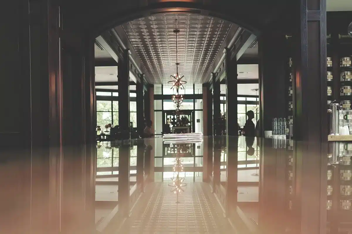 Vintage hotel lobby and an open book evoking A Gentleman in Moscow