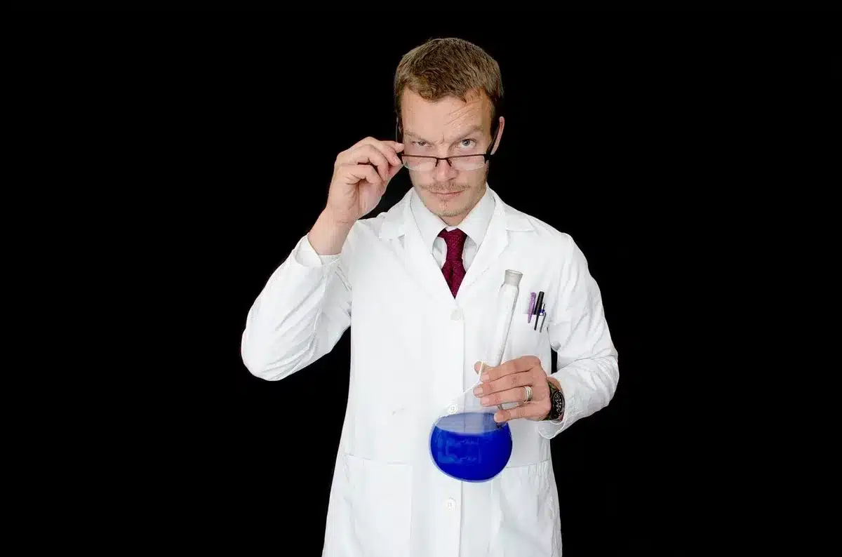 Lab comparison showing researcher examining collagen samples under microscope