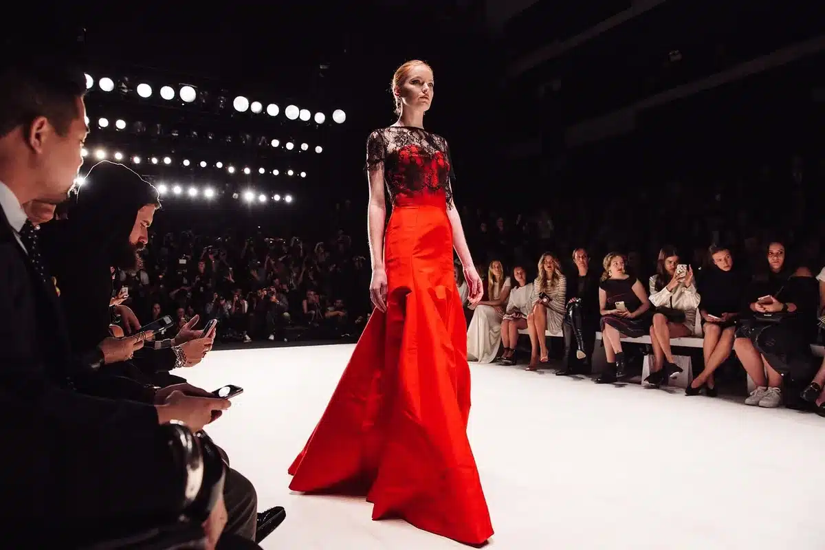 Jenna Ortega posing on the red carpet in a show-stopping gown